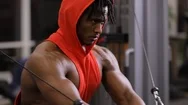 African American Man Making Exercice On Training Apparatus In Gym Stock Footage
