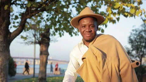 African-American man posing for camera in city Stock Footage 143575358