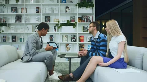 African-American man presenting with tablet in modern Warsaw office Stock Footage 340265736
