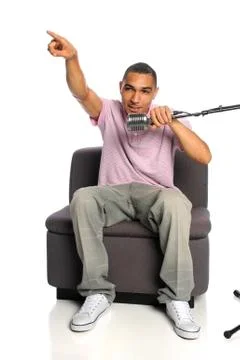 African American Man Using Microphone Stock Photos