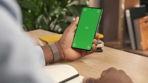 African american man using mobile phone vertical green screen Video stock 149203261