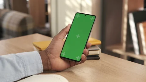 African american man using mobile phone vertical green screen Stock Footage 151530420