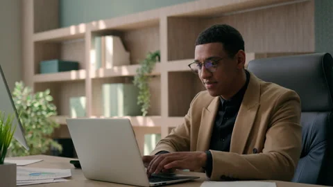 African American man working with documents at office workplace male businessman Stock Footage 250239369
