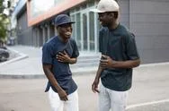 African American Men Friends Speaking Together Stock Photos