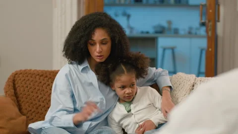 African American mom hugging cuddle Stock Video Pond5