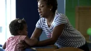 African American Mother Picks Up Daughter Stock Footage
