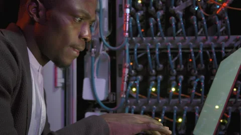 African-American Network Engineer Working in Data Center Stock Footage 155247193