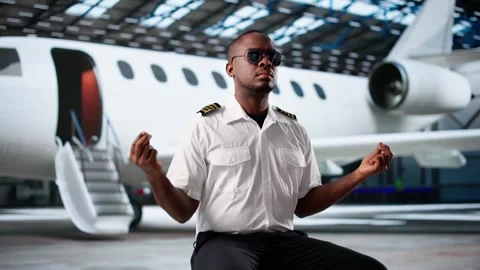 African American Pilot Meditating Stock Footage 310394261