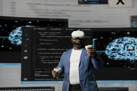 African American programmer engaging in virtual reality with a headset Foto stock