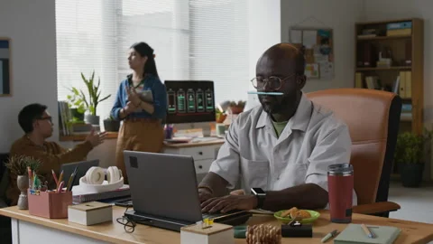 African American Programmer Fooling Around while Working Stock-Footage 317341979