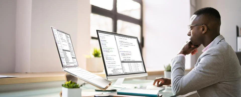 African American Programmer Man Coding Stock-Fotos