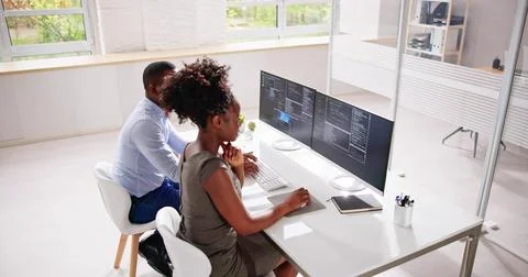African American Programmer Woman Coding On Computer Foto stock