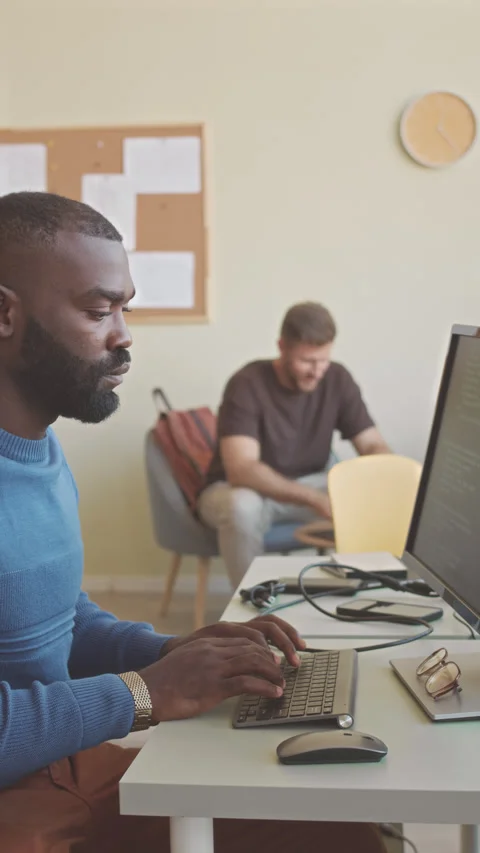 African American Programmer Working on Computer in Office Stock Footage 224030052