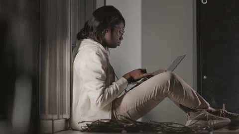 African American Programmer Working on Floor Stock-Footage 162460694