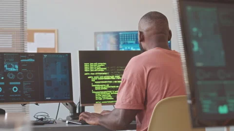 African American Programmer Working on New Software Program Stock Footage 224066806