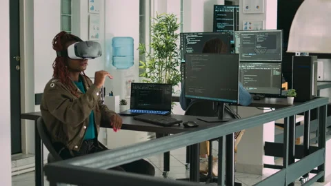 African american programmer working with vr glasses Stock Footage 217409818