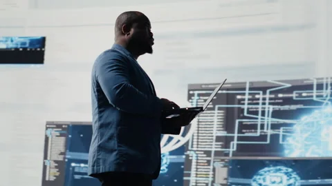 African american skilled engineer programming for innovation hub Stock Footage 312303335