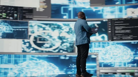 African american skilled engineer programming for innovation hub Stock Footage 312479591