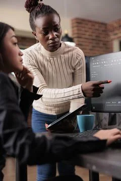 African american software developer pointing out cloud database processing Foto stock