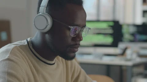 African American Software Developer Using Laptop at Workplace Stock Footage 259149942