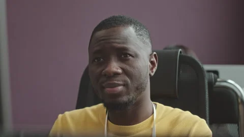 African American Software Developer Working in Office Stock Footage 247621745