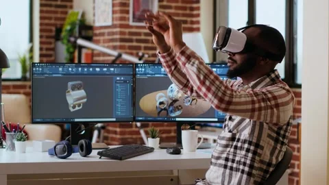 African american software developer working with virtual reality headset Stock Footage 319711850