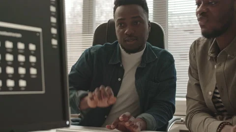 African-American Software Developers Working in Team Stock Footage 165721885