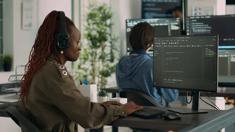 African american software engineer working focused on programming it language 스톡 사진