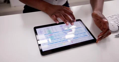 African American Spreadsheet Data Analyst Stock Footage 248121194