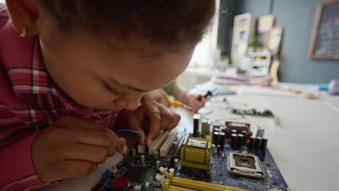 African American Student Assembling Computer Motherboard in Stem Class Stock Footage 340550502