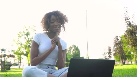 African american student e learning using computer webcam chat. Young woman Stock Footage 138983706
