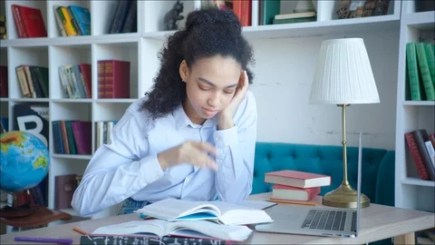 African american student preparing hardly for examination in university Stock Footage 104421385