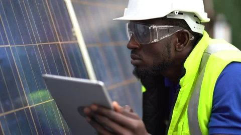 African american technician using laptop computer checking Solar Cell panels Stock Footage 154849404