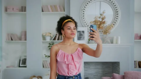 African American Teen Girl Using App on Mobile Smartphone Smiling Happy. Young Stock Footage 155639811