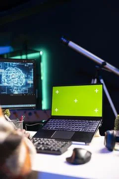 African american web developer using isolated mockup on pc and writing code Stockfoto's