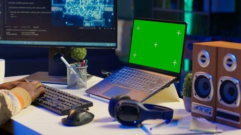 African american web developer using isolated mockup on pc and writing code Foto stock