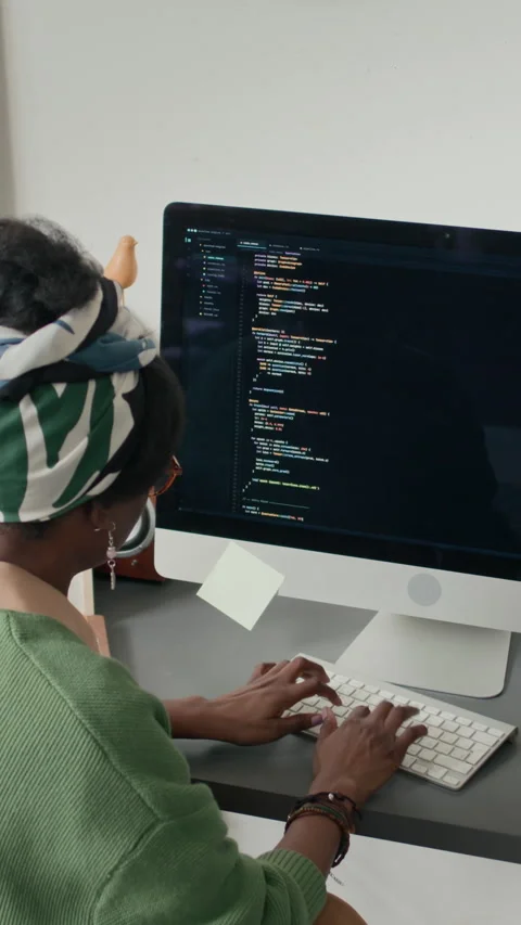African American Woman Coding On Computer At Desk Stock Footage 333249292