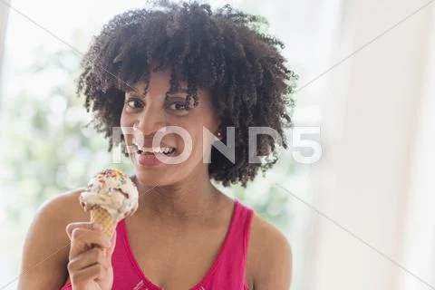 African American Woman Eating Ice Cream Cone