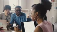 African American Woman Leading Office Meeting. Young Multiethnic Group Discuss Stock Footage