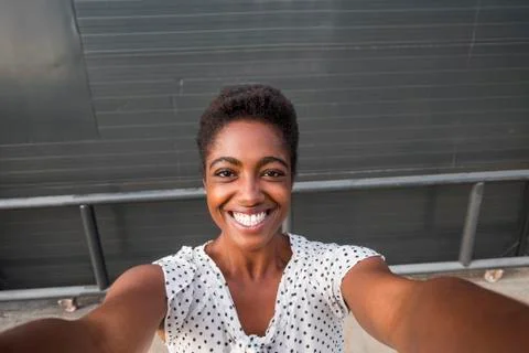 African American woman smiling for selfie Stock Photos