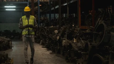African american worker using tablet for check inventory in warehouse. Video stock 143956947