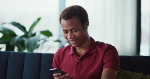 African american young man using smartphone for social application connecting Stock Footage 148161204