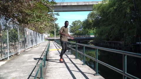 African american young runner man Practice Footwork Running Drill in morning Stock Footage 146651486