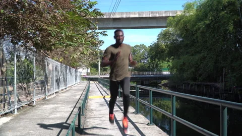 African american young runner man Practice Footwork Running Drill in morning Stock Footage 146651491