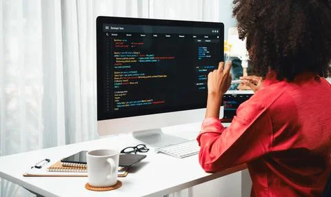 African American's developer. Coding Software project on screen. Tastemaker. Stock Photos