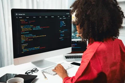 African American's developer. Coding Software project on screen. Tastemaker. Stockfoto's