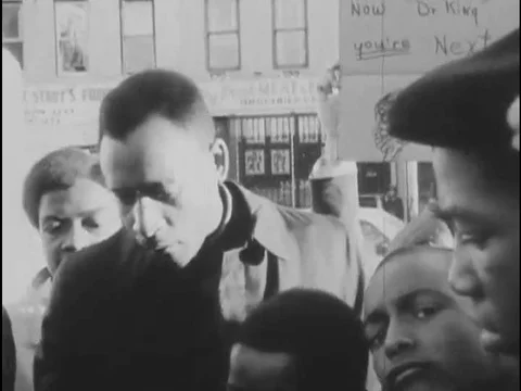 African Americans, on the street, react angrily and threateningly to the death Stock Footage 74936758