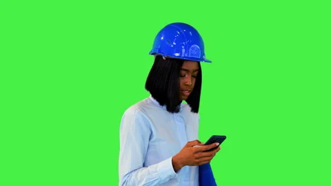 African architect construction project developer walk read messages in mobile Stock Footage 157278312