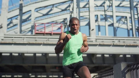 African athlete practicing backward running drill Stock Footage 117064293