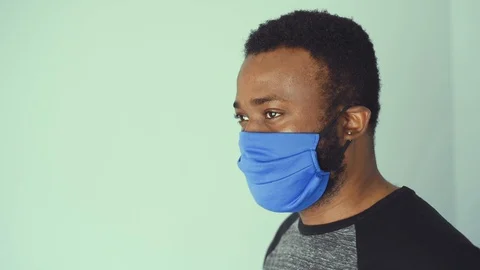 African in blue mask Stock Footage 128740910